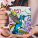 Nature-themed personalized coffee cup. Handcrafted hummingbird from Michigan. Close-up of personalized faux stained glass hummingbird mug.